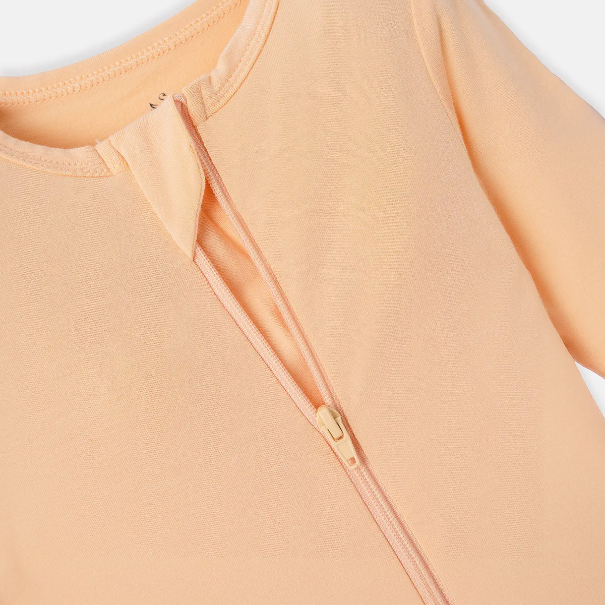 Peach Fuzz Convertible Footie Pajamas